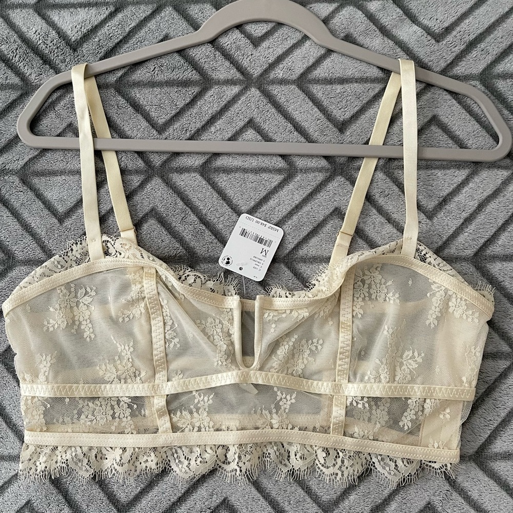 Cream/ivory layer in lace bustier free people M new with tags